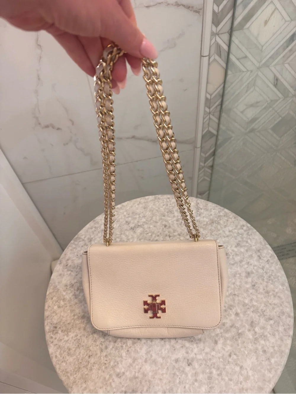 Tory Burch Light Cream Pebbled Leather Crossbody with Gold Logo Chain